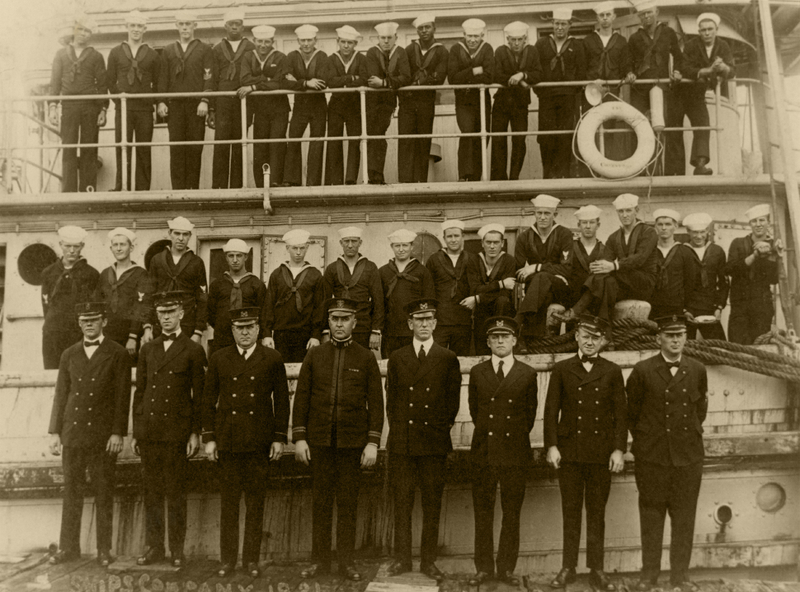 Ship’s Company beside and on USS Conestoga, at San Diego, California, circa early 1921. Image: U.S. Naval History and Heritage Command NH 71503